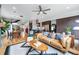 Open floor plan showcasing the kitchen, dining, and living area with hardwood floors and stylish decor at 3201 W 25Th Ave, Denver, CO 80211