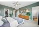 Spacious main bedroom includes a walk-in closet and an ensuite bathroom with a soaking tub at 3201 W 25Th Ave, Denver, CO 80211