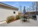 Private outdoor patio with dining set, umbrella, and grill at 3201 W 25Th Ave, Denver, CO 80211