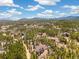 Charming mountain home surrounded by tall trees in a peaceful, scenic location at 1140 Indian Peak Rd, Golden, CO 80403