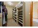 Walk-in closet with custom built-in shelves for ample storage and organization at 1140 Indian Peak Rd, Golden, CO 80403