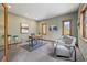 Bright and airy office space featuring warm wood trim, plush carpet, and serene decor at 1140 Indian Peak Rd, Golden, CO 80403