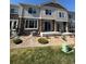 The home's backyard has a stone landscape and a well-maintained lawn at 14883 E Crestridge Dr, Centennial, CO 80015
