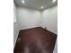 An empty bedroom with hardwood flooring at 14883 E Crestridge Dr, Centennial, CO 80015