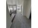 Well-lit upstairs hallway with carpeted floors and a decorative wood and iron railing at 14883 E Crestridge Dr, Centennial, CO 80015