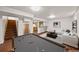 Finished basement boasts a pool table and bar area, perfect for entertaining guests at 10874 Pearl Ct, Northglenn, CO 80233