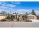 Charming single-story home featuring a manicured front yard and a welcoming red front door at 10874 Pearl Ct, Northglenn, CO 80233