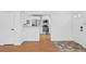 Contemporary kitchen featuring stainless steel appliances and a breakfast bar at 10874 Pearl Ct, Northglenn, CO 80233