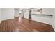 Expansive living area showcases beautiful wood floors, providing a versatile living space at 10874 Pearl Ct, Northglenn, CO 80233