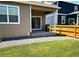 Back patio with a grill overlooking the lawn at 14758 Normande Dr, Mead, CO 80542