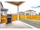 Backyard patio includes a grill, concrete surface and a small garden area perfect for relaxation or entertaining at 14758 Normande Dr, Mead, CO 80542