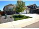 Charming single-Gathering home featuring a well-manicured lawn and a two-car garage at 14758 Normande Dr, Mead, CO 80542