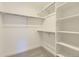 Bright, walk-in closet featuring adjustable shelving and ample storage space for an organized wardrobe at 2968 S Poppy St, Morrison, CO 80465