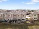 Aerial view of fenced-in backyard with lawn and patio area at 13181 Grant W Cir # B, Thornton, CO 80241