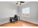 Bright bedroom featuring a ceiling fan, natural light, and a desk setup at 13181 Grant W Cir # B, Thornton, CO 80241