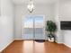 Bright and airy dining area with sliding glass doors leading to the outdoor space for easy entertaining at 13181 Grant W Cir # B, Thornton, CO 80241