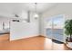 Bright and airy dining area with sliding glass doors leading to the outdoor space for easy entertaining at 13181 Grant W Cir # B, Thornton, CO 80241
