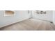 Carpeted bedroom with two windows and neutral colors at 6616 N Nepal St, Aurora, CO 80019