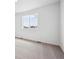 Cozy bedroom showcasing carpeted floors and a window with neighborhood views at 6616 N Nepal St, Aurora, CO 80019