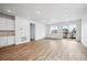 Bright living room with modern flooring, neutral walls, and lots of natural light at 6616 N Nepal St, Aurora, CO 80019