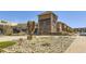 A commercial building with restaurants and shops, plus an outdoor sculpture at 2214 Central Park Way, Superior, CO 80027