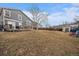 A spacious backyard with a deck, storage shed, and play area offers great possibilities for outdoor enjoyment at 10752 Steele St, Northglenn, CO 80233