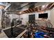 Basement gym with exercise equipment, machines, and a television at 10752 Steele St, Northglenn, CO 80233