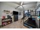 bedroom with a bunk bed with slide, TV, and white walls at 10752 Steele St, Northglenn, CO 80233