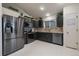 Well-appointed kitchen featuring stainless steel appliances, granite countertops, and ample cabinet space at 10752 Steele St, Northglenn, CO 80233