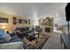 Spacious living room with comfortable seating, stylish decor, and an open layout at 10752 Steele St, Northglenn, CO 80233