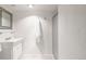 Simple bathroom featuring a vanity and a framed shower, both in white at 1140 Devonshire Ct, Lafayette, CO 80026