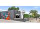 Contemporary building exterior with vibrant mural, outdoor patio and architectural details at 1140 Devonshire Ct, Lafayette, CO 80026