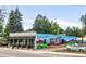 Street-level view of building with colorful mural and front windows at 1140 Devonshire Ct, Lafayette, CO 80026