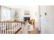 Bright living room featuring a fireplace, hardwood floors, and neutral decor at 1140 Devonshire Ct, Lafayette, CO 80026