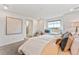 Bright and spacious main bedroom with a sitting area, lots of natural light, and ensuite bath at 3331 N Buchanan Way, Aurora, CO 80019