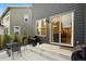 Backyard featuring a patio with a table and grill, perfect for outdoor entertaining at 11151 W 53Rd Dr, Wheat Ridge, CO 80033