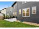 Spacious backyard featuring a patio and lawn, perfect for outdoor activities at 11151 W 53Rd Dr, Wheat Ridge, CO 80033