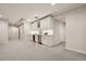 Finished basement with modern bar area and open space for entertaining at 11151 W 53Rd Dr, Wheat Ridge, CO 80033
