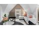 Comfortable living room featuring a white sofa, a radiator and a window with natural light at 1136 N Logan St # 8, Denver, CO 80203