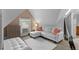 Comfortable living room featuring a white sofa, a radiator and a window with natural light at 1136 N Logan St # 8, Denver, CO 80203