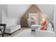 Comfortable living room featuring a white sofa, a radiator and a window with natural light at 1136 N Logan St # 8, Denver, CO 80203