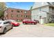 Exterior image of parking lot with multiple cars, showing convenient parking at 1136 N Logan St # 8, Denver, CO 80203