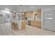 Bright kitchen with stainless steel appliances, wood cabinets, and a large island with a white countertop at 328 Quay St, Lakewood, CO 80226