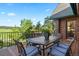Inviting outdoor deck with comfortable seating and views of the picturesque landscape at 6150 Bluebell Ln, Evergreen, CO 80439