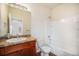 Clean bathroom with tub, shower, and updated vanity at 1788 Taos St, Brighton, CO 80603