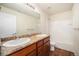 Bathroom with double vanity and bathtub at 1788 Taos St, Brighton, CO 80603