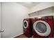 Laundry room with washer, dryer, and shelving at 1788 Taos St, Brighton, CO 80603
