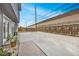 Spacious backyard patio with a large concrete surface and privacy fence at 1841 Ruth Dr, Thornton, CO 80229