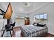 Bright bedroom offers a window view, a comfortable bed, and a desk perfect for a study area at 1841 Ruth Dr, Thornton, CO 80229