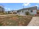 Charming home featuring gray siding, a well-kept yard, and a welcoming entrance at 1841 Ruth Dr, Thornton, CO 80229